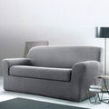 Divano confortevole bianco con braccioli