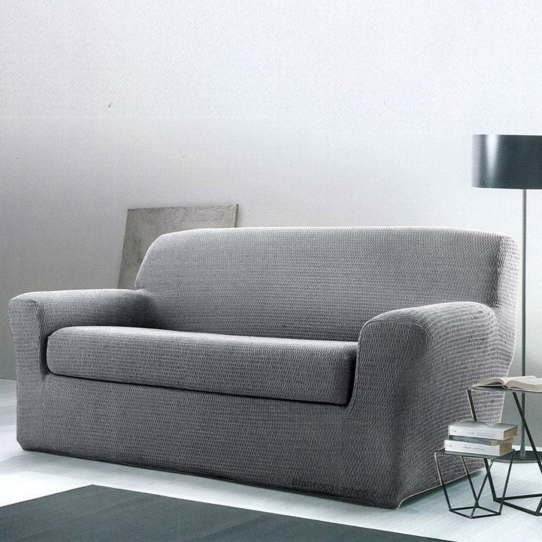 Divano confortevole bianco con braccioli