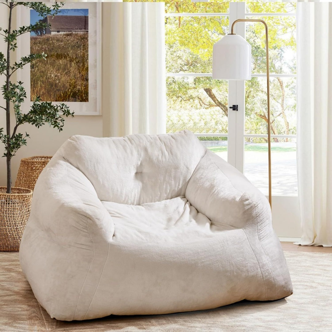 Poltrona da soggiorno con braccioli rivestimento in velluto beige